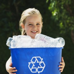 bigstock_Little_Girl_Holding_Recycling__3911999
